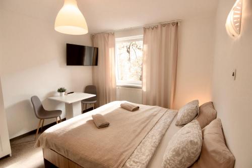 Ένα ή περισσότερα κρεβάτια σε δωμάτιο στο City centre - Room 2 with shared bathroom