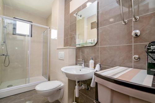 Ένα μπάνιο στο Apartmani Konjevic Savina