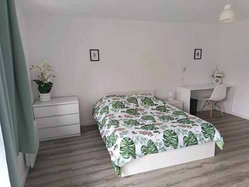 Postel nebo postele na pokoji v ubytování Maison proche Fatima batalha