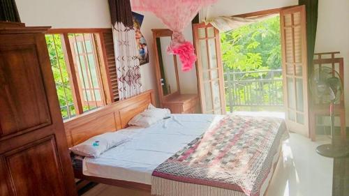 Ένα ή περισσότερα κρεβάτια σε δωμάτιο στο Hiru Villa