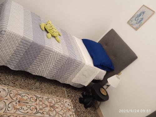 Ein Bett oder Betten in einem Zimmer der Unterkunft Genova House