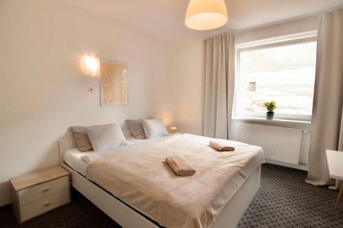 Ένα ή περισσότερα κρεβάτια σε δωμάτιο στο City centre - Room 3 with shared bathroom