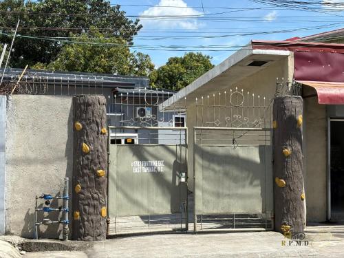 a gate in front of a building at CJ Apartments-III in Olongapo