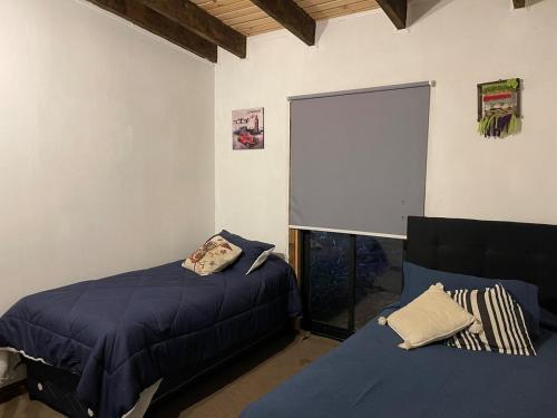 Ένα ή περισσότερα κρεβάτια σε δωμάτιο στο Cabin with Jacuzzi