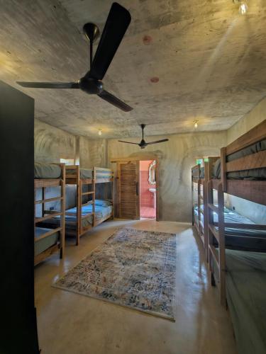 Ένα ή περισσότερα κρεβάτια σε δωμάτιο στο Casba Hostel