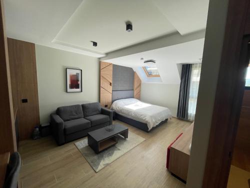 Ένα ή περισσότερα κρεβάτια σε δωμάτιο στο Escape Panorama Apartmani Tara