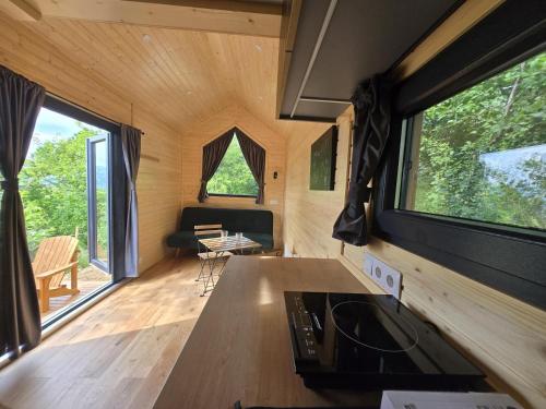 a view of a living room in a tiny house at In the Wild Volcano Sea Side 