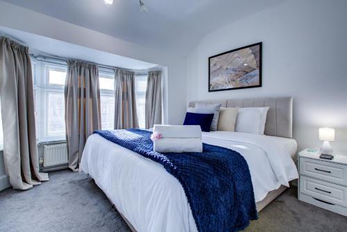 Voodi või voodid majutusasutuse Spacious 4-Bed House in Welling - Free parking toas