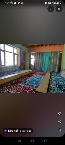 a picture of a room with a room with a room with a room at Home stay in Kaza