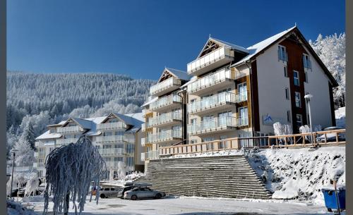 Apartament ISCHGL Czarna Góra Resort om vinteren