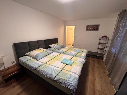 a bedroom with a large bed in a room at Diezer Apartments I Altstadt in Diez