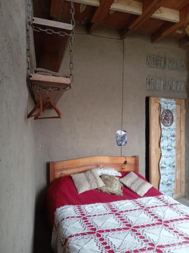 Ένα ή περισσότερα κρεβάτια σε δωμάτιο στο Lodge Malezas del Desierto