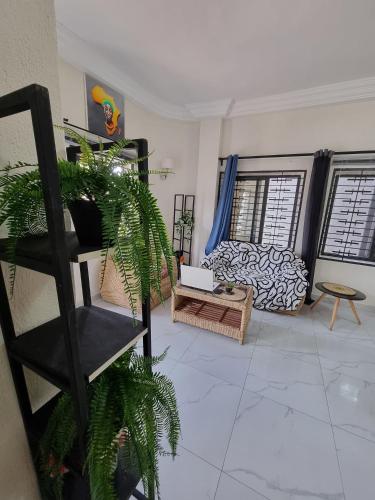 Postel nebo postele na pokoji v ubytování Appartmeublé , Cotonou