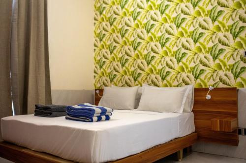 Postel nebo postele na pokoji v ubytování Lux Hotel Mathiveri