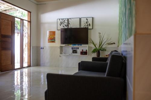 Μια τηλεόραση ή/και κέντρο ψυχαγωγίας στο Lux Hotel Mathiveri