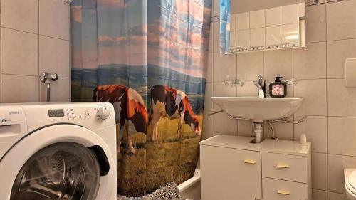 Koupelna v ubytování Gemütliche 2-Zimmer Wohnung mir Bergblick