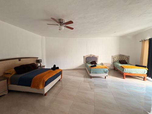 Postel nebo postele na pokoji v ubytování Casa ziranda