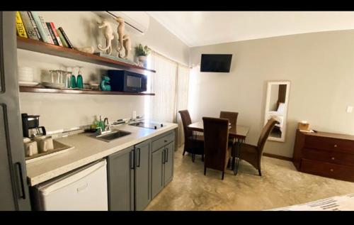 Kuchyň nebo kuchyňský kout v ubytování Mata Rocks Resort