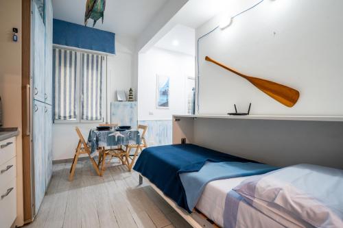 Postel nebo postele na pokoji v ubytování IM INTERNATIONAL 1 - Galleria Raggio 3/9