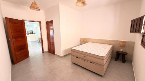 Postel nebo postele na pokoji v ubytování Casa 123 Milagres - Casa em São Miguel dos Milagres, Alagoas