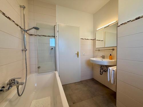 Ένα μπάνιο στο Ferienhaus Rauschberg 10