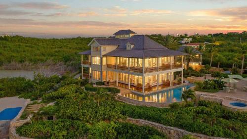 an aerial view of a house with a pool at Villa Oasis Anguilla in Long Bay Village