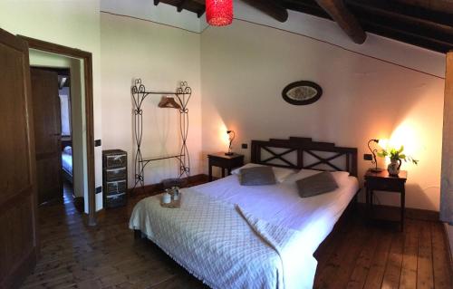 Ένα ή περισσότερα κρεβάτια σε δωμάτιο στο Casa Sharon