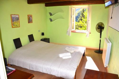 Postel nebo postele na pokoji v ubytování Beppe's house