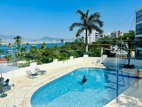 Πισίνα στο ή κοντά στο SUITE INTI vista al mar