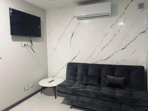 TV/trung tâm giải trí tại AT Apart Equipetrol