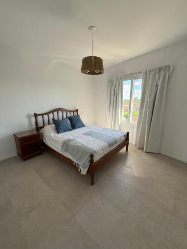 Ένα ή περισσότερα κρεβάτια σε δωμάτιο στο Ribera