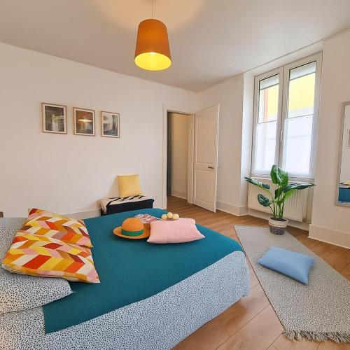 Postel nebo postele na pokoji v ubytování Appartement chaleureux