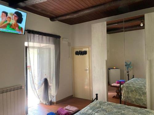 Ένα ή περισσότερα κρεβάτια σε δωμάτιο στο B&B La Suite di Alba