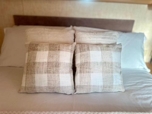 Postel nebo postele na pokoji v ubytování East Coast