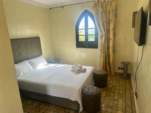 TV a/nebo společenská místnost v ubytování Cosy villa a marrakech