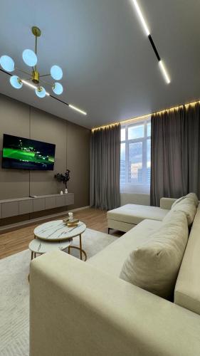 Posezení v ubytování Luxury Apartment in Buqar Jyrau
