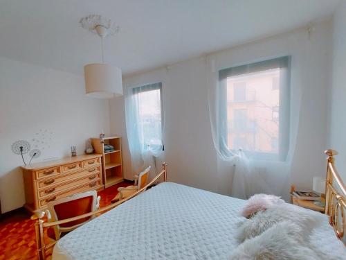 Ένα ή περισσότερα κρεβάτια σε δωμάτιο στο Apartment in the historic center - Tirano - Casa Vacanze da Amy