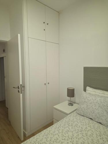 Ένα ή περισσότερα κρεβάτια σε δωμάτιο στο Me&You - Family Beach House