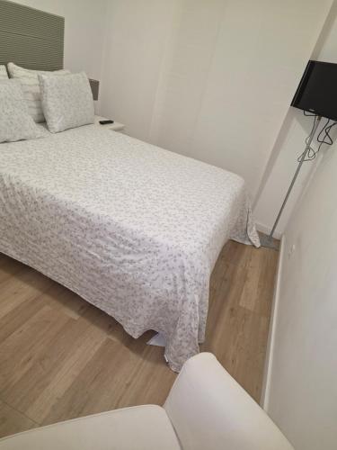 Ένα ή περισσότερα κρεβάτια σε δωμάτιο στο Me&You - Family Beach House