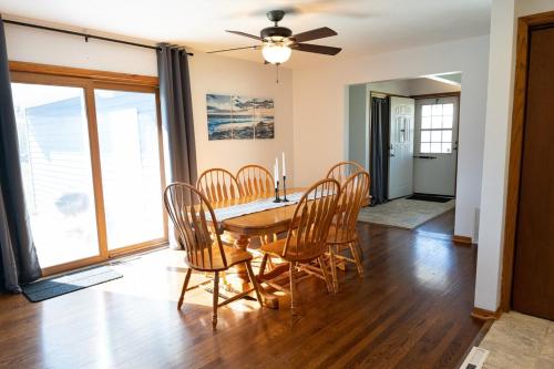a dining room with a table and chairs at Convenient Countryside Oasis in Caledonia