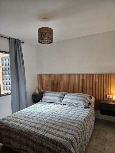 Postel nebo postele na pokoji v ubytování Luminoso departamento