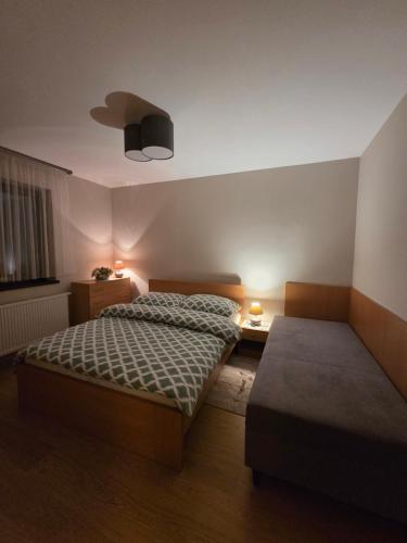 Postel nebo postele na pokoji v ubytování Apartmány Bartky