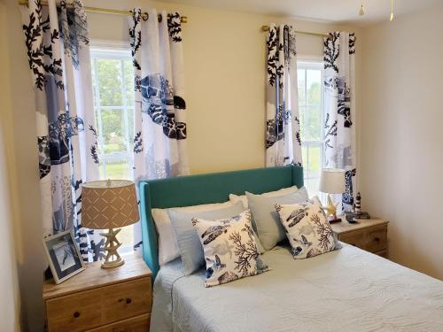 Postel nebo postele na pokoji v ubytování Coral Crest