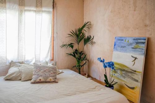 Ένα ή περισσότερα κρεβάτια σε δωμάτιο στο Casa Alma