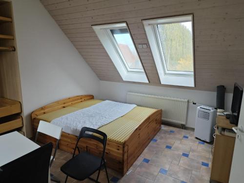 Η κουζίνα ή μικρή κουζίνα στο Dachgeschoss Harbour Apartments Höri