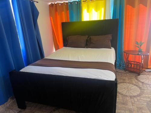 Ένα ή περισσότερα κρεβάτια σε δωμάτιο στο FredyGreenhouse