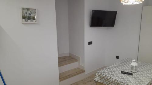 TV a/nebo společenská místnost v ubytování La casita