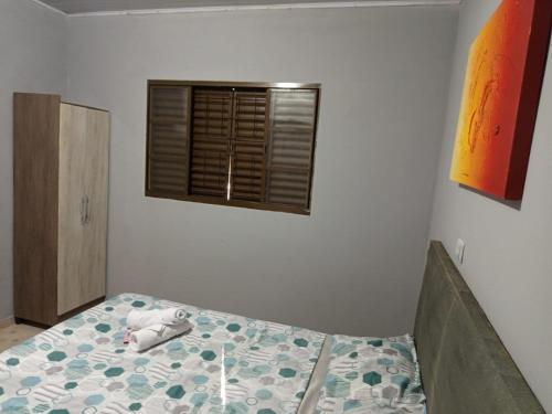 casa para seu descansoにあるベッド