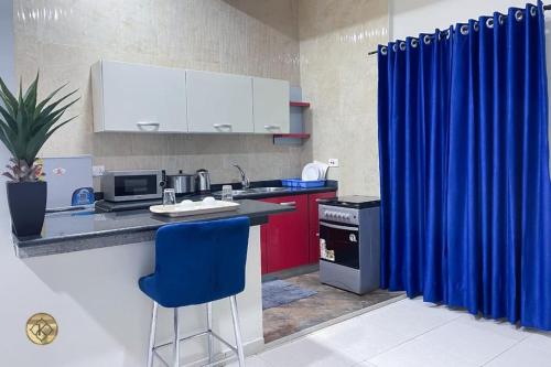 Kuchyň nebo kuchyňský kout v ubytování Cozy 1-bedroom Apartment , East Legon- 10 Minutes to Kotoka Intl Airport