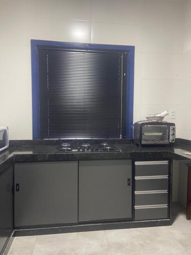 Kuchyň nebo kuchyňský kout v ubytování Casas da Villa - CASA DE TEMPORADA